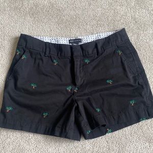 Black shorts with palm trees